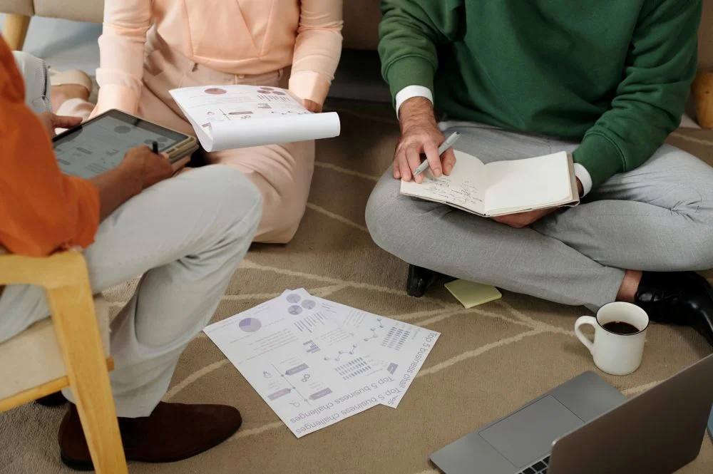 A couple with notebooks
